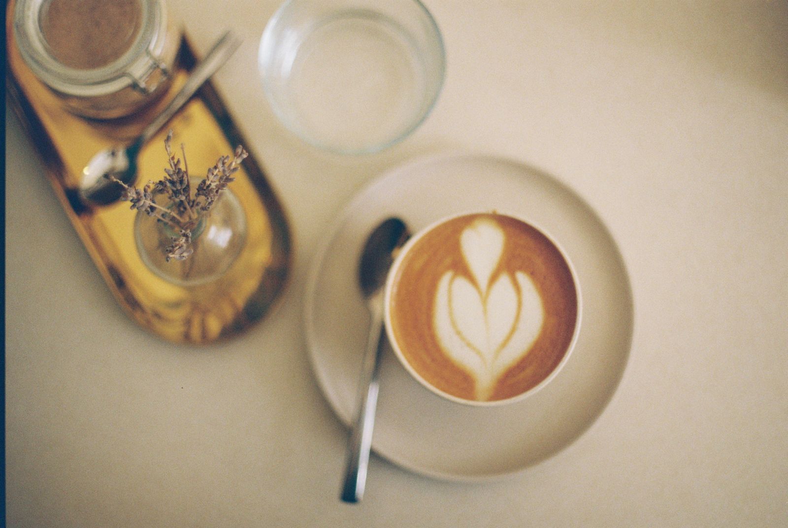 Cafe Culture in Seoul: A Guide to Korea's Coffee Scene (2026) Latte art in a coffee cup at a cozy cafe