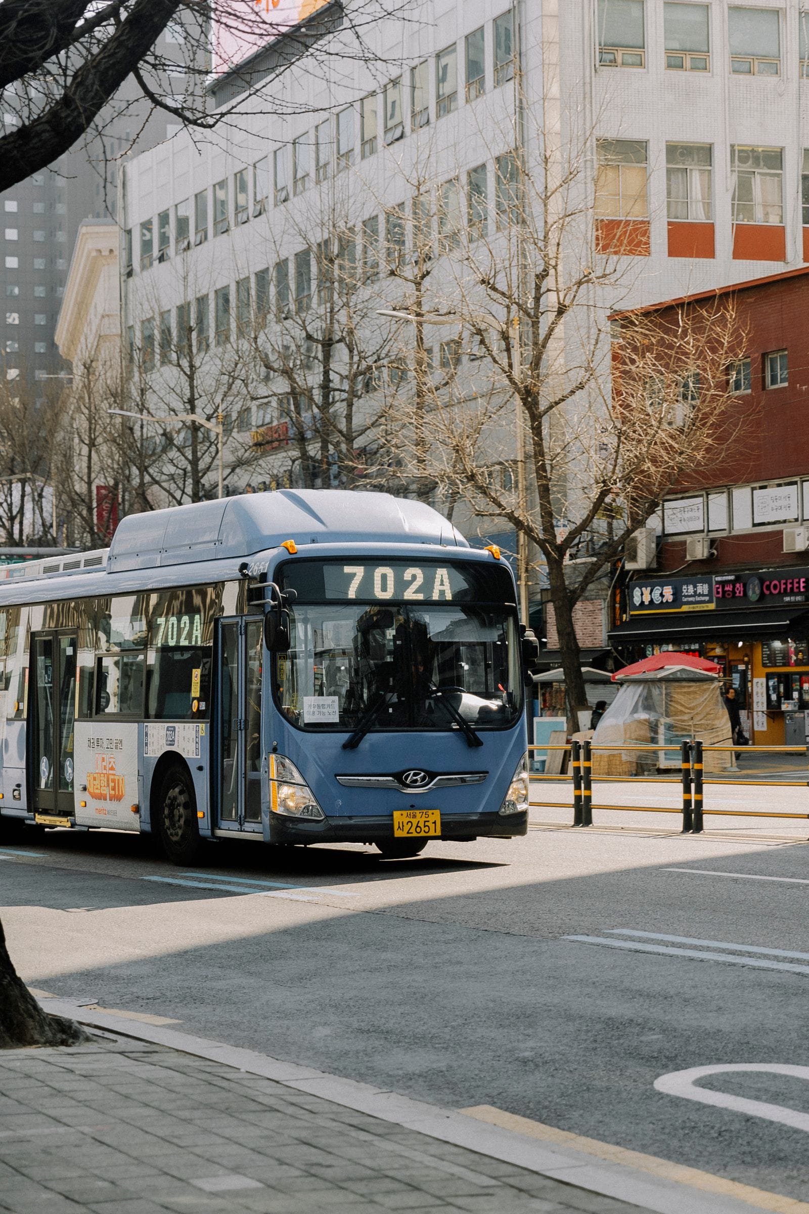 Getting Around Seoul: A First-Timer's Guide to the Subway, Buses & Taxis A city bus on a street in Seoul, South Korea