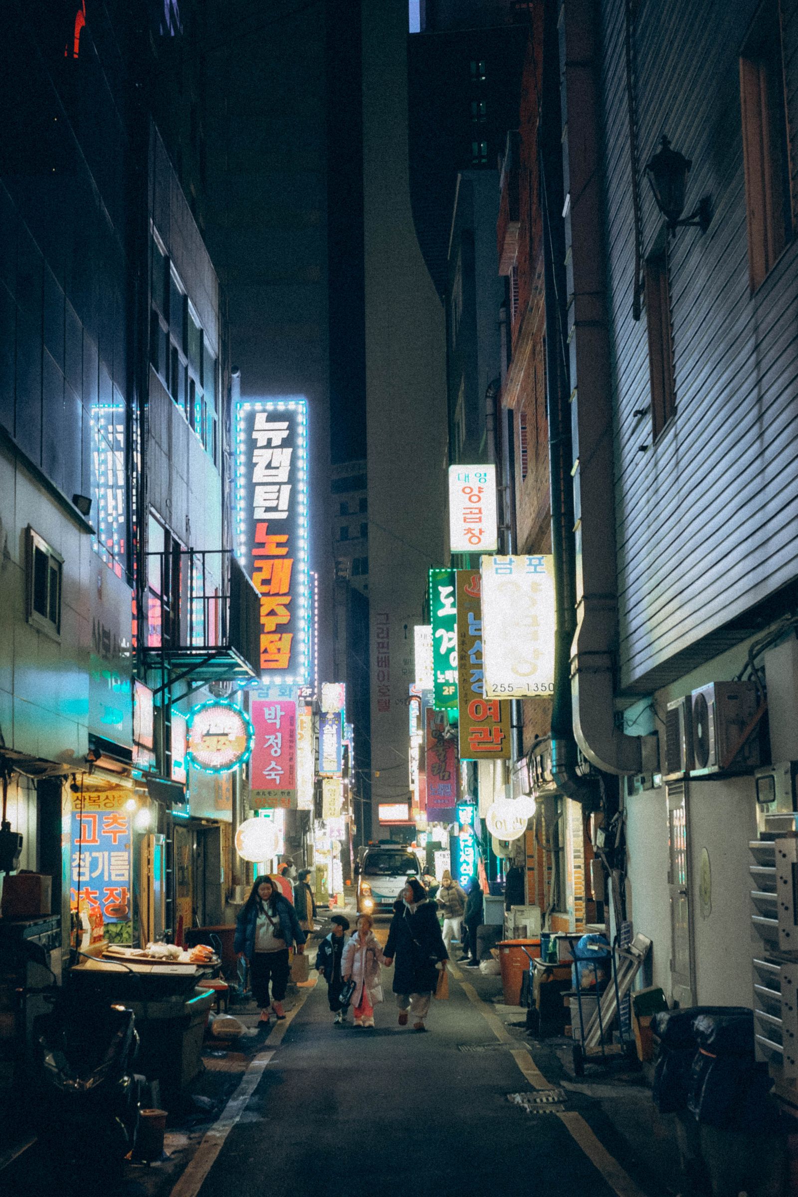Hongdae, Seoul: Things to Do, Nightlife & Where to Stay (2026) A vibrant night street scene in Seoul near Hongdae