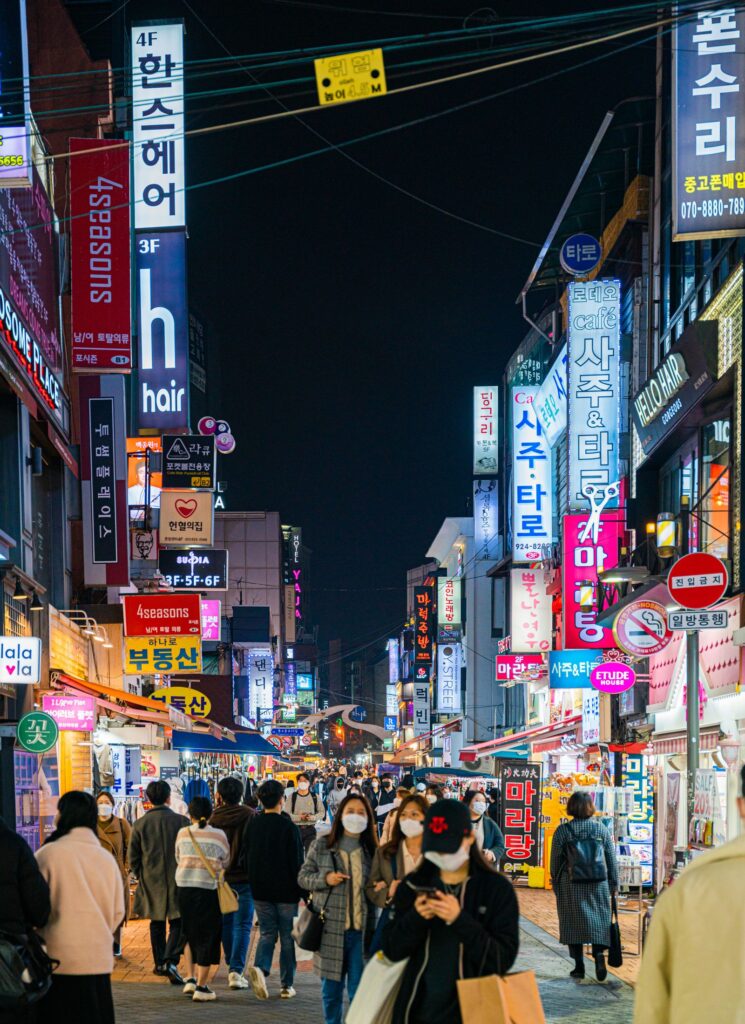 Itaewon, Seoul: Food, Bars & Where to Stay (2026) A busy night street with bars and restaurants in Itaewon, Seoul