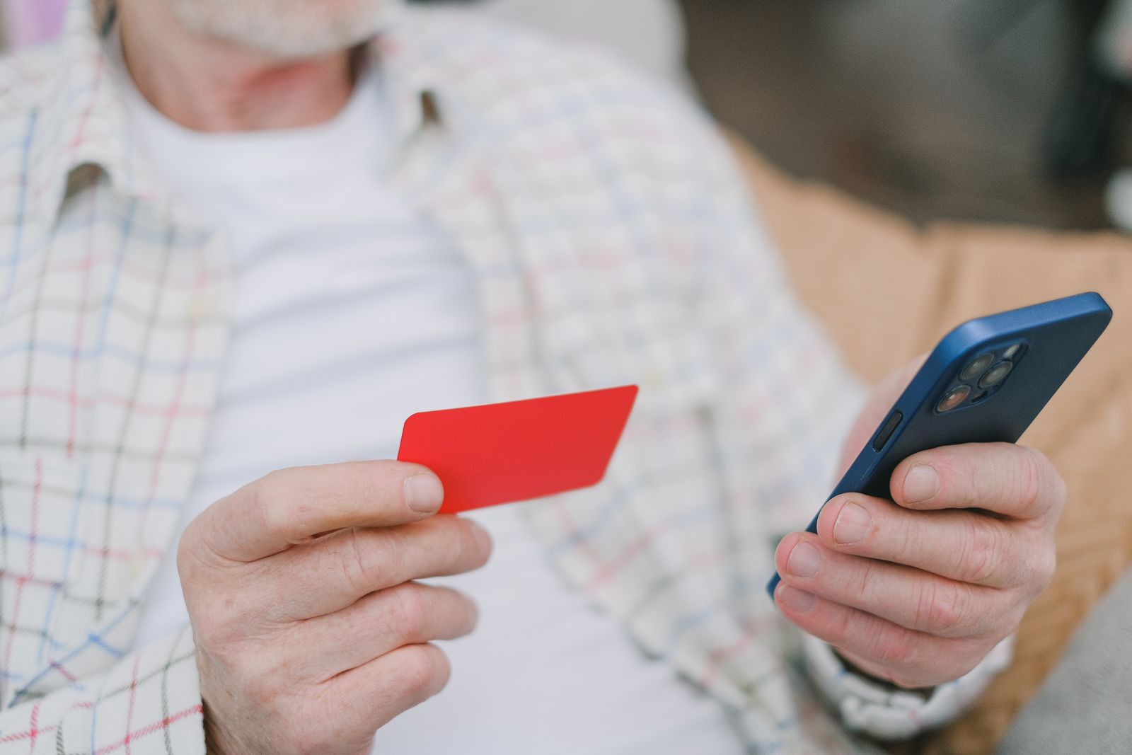 Korea SIM Card & eSIM: A Guide to Staying Connected (2026) Hands holding a SIM card and a smartphone, the essentials of a Korea SIM card setup