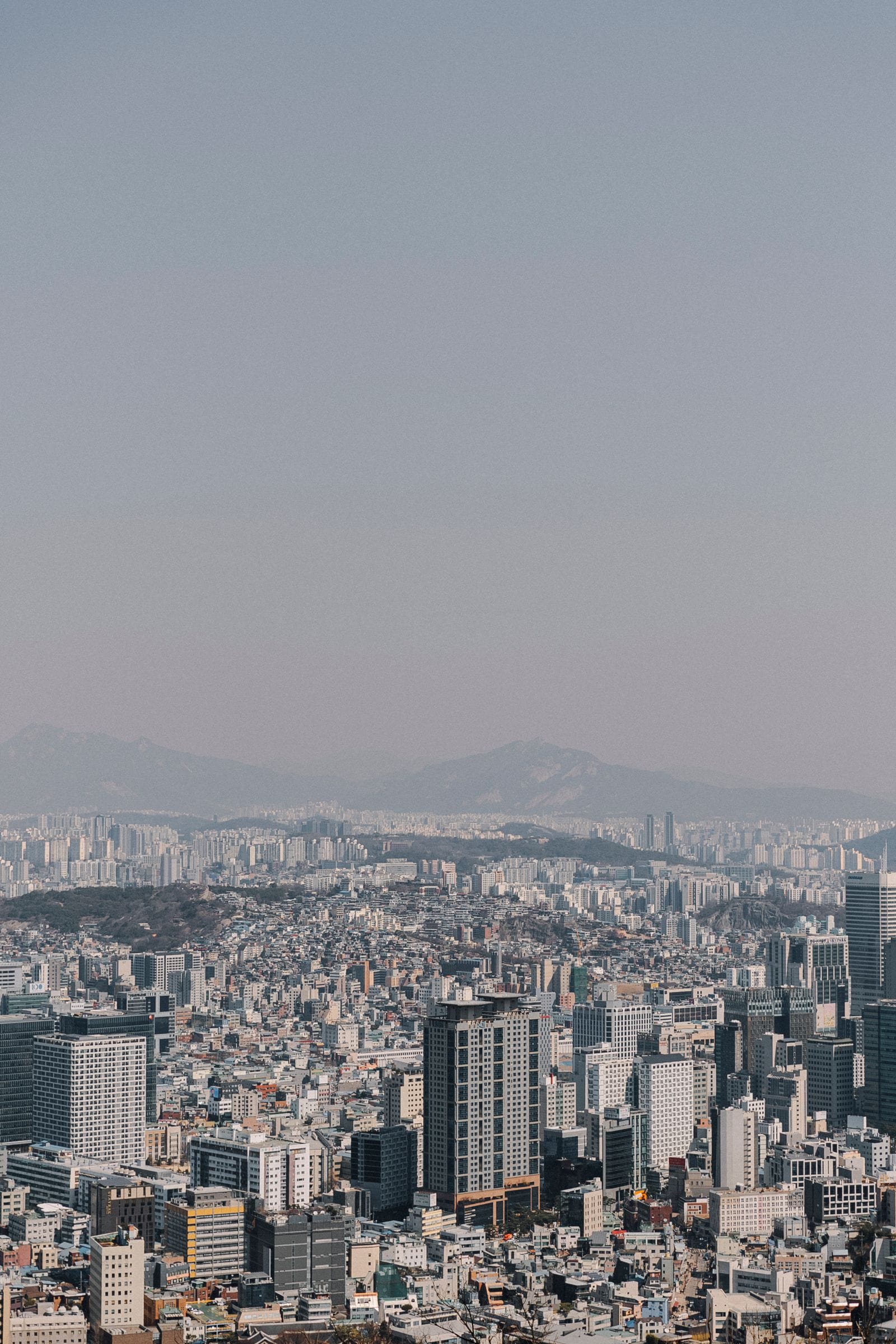 Seongsu-dong: A Guide to Seoul's Coolest Neighborhood (+ Where to Stay) The Seoul skyline across the city