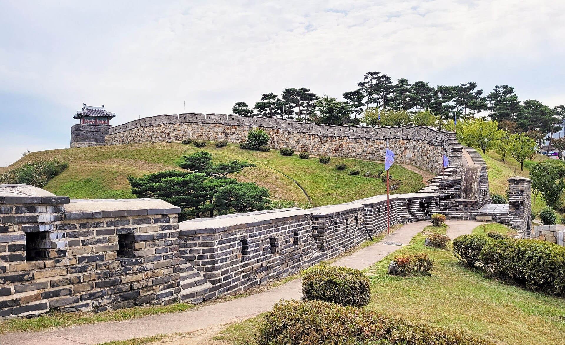 A gate and watchtower along the Hwaseong Fortress wall walk in Suwon, South Korea