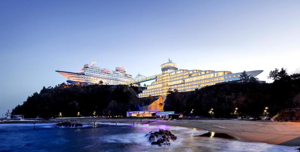 Where to Stay in Gangneung: Best Areas & Hotels for Every Trip (2026) Sun Cruise Resort and Yacht, a hotel shaped like a cruise ship on a cliff above Jeongdongjin Beach