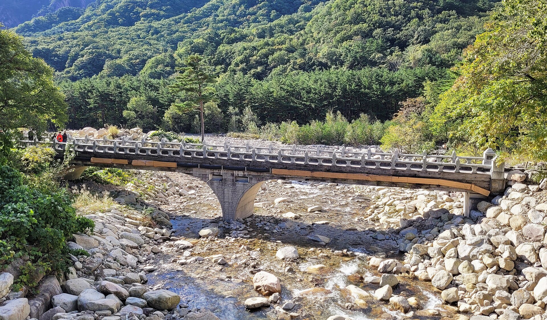 A footbridge over a mountain stream in Seoraksan National Park, a short drive from where to stay in Sokcho
