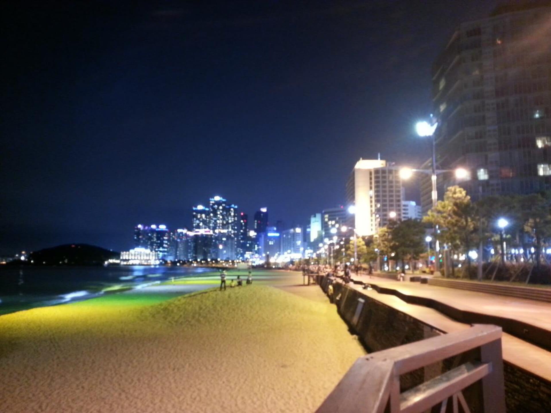 Busan Night Festa 2026: Night Walk & Night Music Campnic Guide A Busan beach along the coastline where the festival's Night Walk and Night Music Campnic events take place