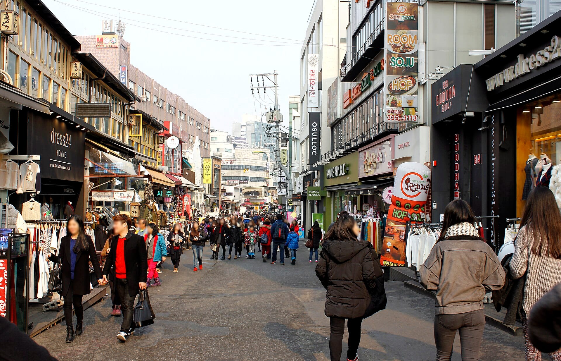 Where to Stay in Hongdae, Seoul: Best Hotels for Nightlife & Budget (2026) A busy street corner in Hongdae, Seoul's nightlife and student district