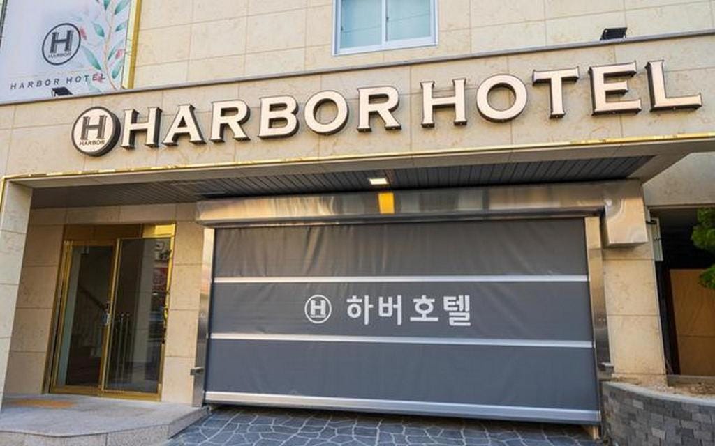Where to Stay in Tongyeong: Best Areas & Hotels for Every Trip (2026) A room facing Dongho Harbor at Tongyeong Anchovy Tourist Hotel