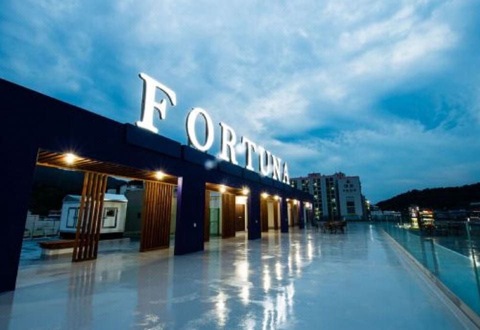 Where to Stay in Tongyeong: Best Areas & Hotels for Every Trip (2026) A guest room at Tongyeong Tourist Hotel near Jungang Market
