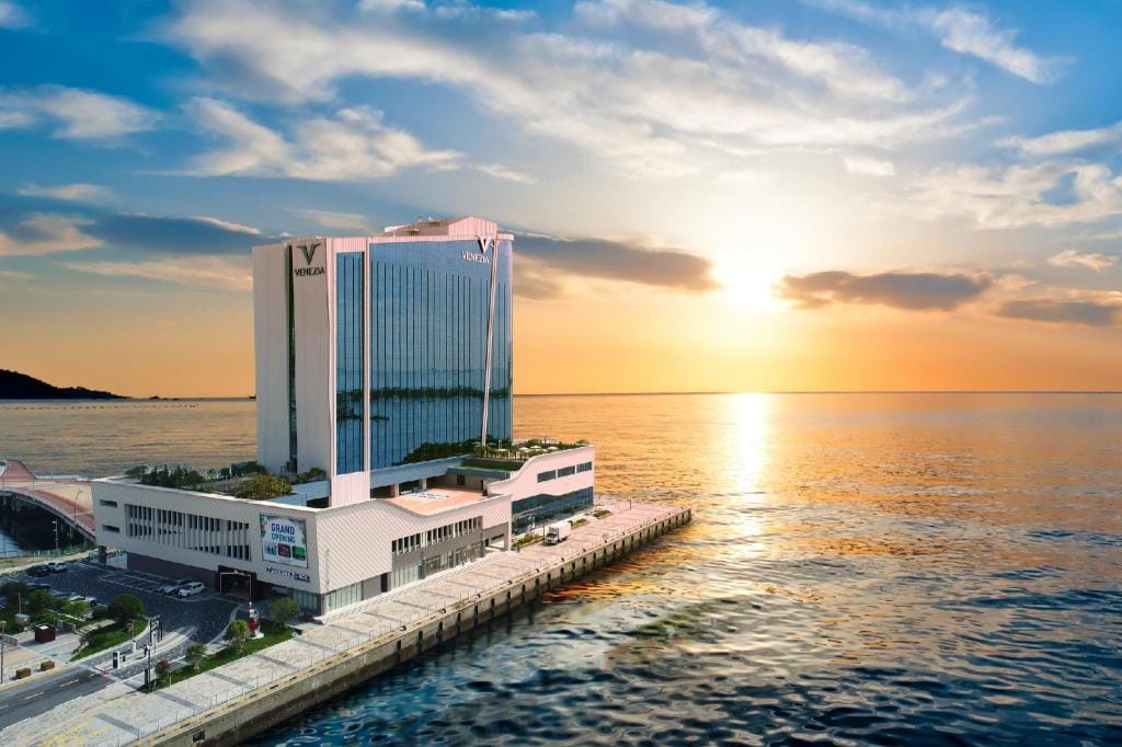 Where to Stay in Yeosu: Best Areas & Hotels for Every Trip (2026) A harbor-facing room at Yeosu Venezia Hotel & Suite next to Expo Park