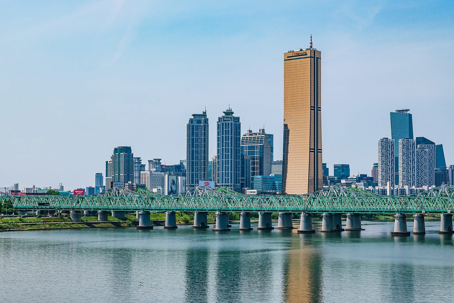 The Yeouido skyline in Seoul with the Hangang Railway Bridge at night, near where the Seoul Moon balloon floats over Yeouido Park