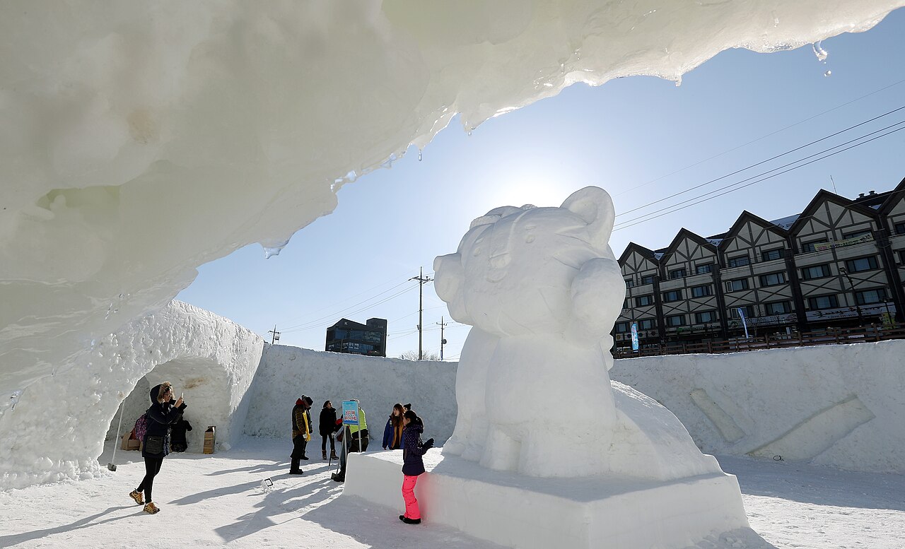 Snow-covered festival grounds in the Gangwon mountains during a Korean winter snow festival