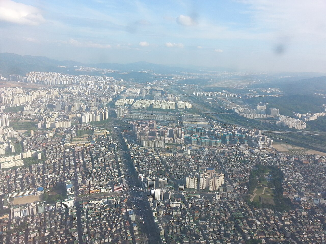 View east over Seoul's apartment blocks and hills from the Seoul Sky observatory in Lotte World Tower