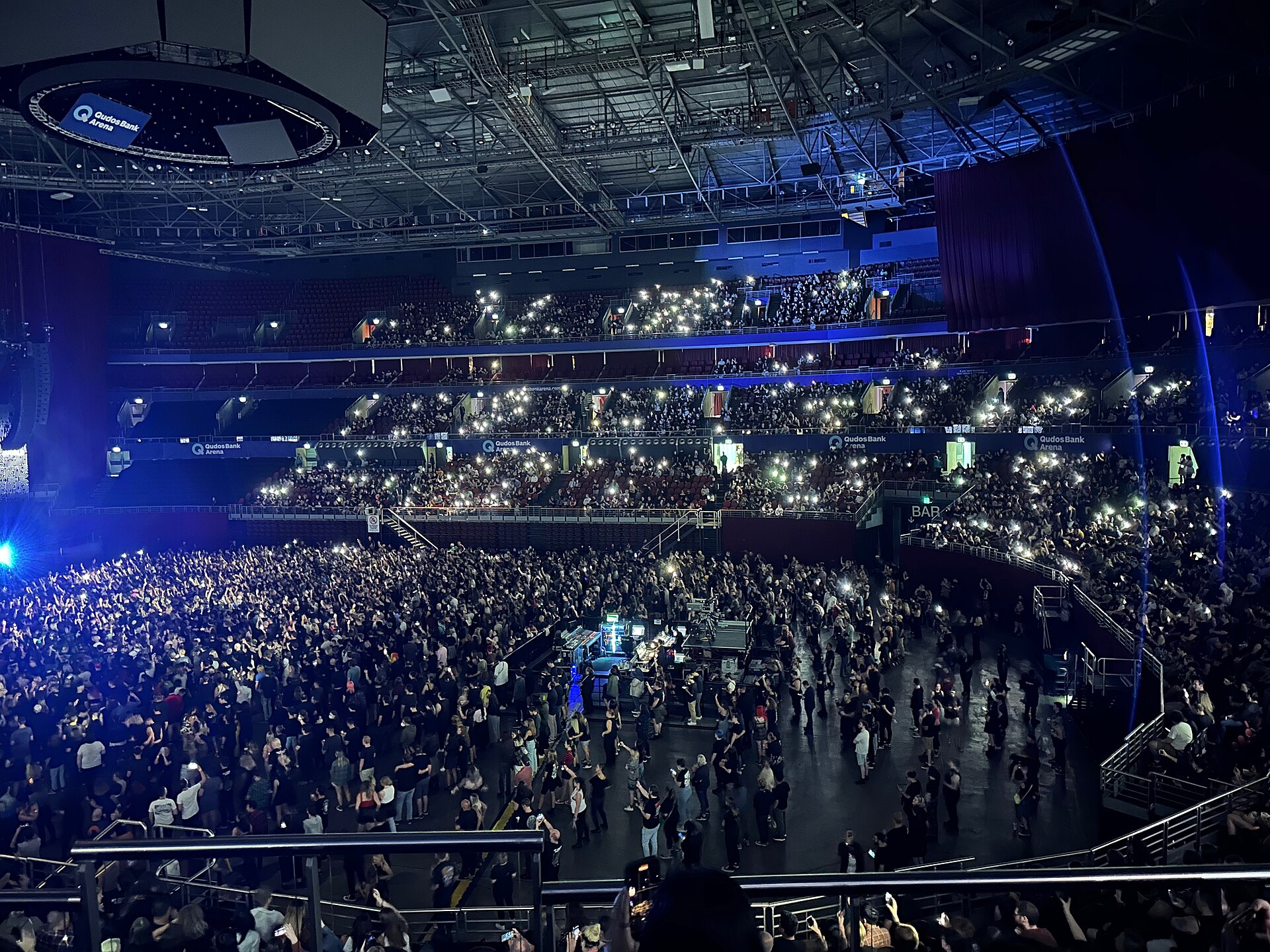 My Chemical Romance performing on stage at an arena show in 2023